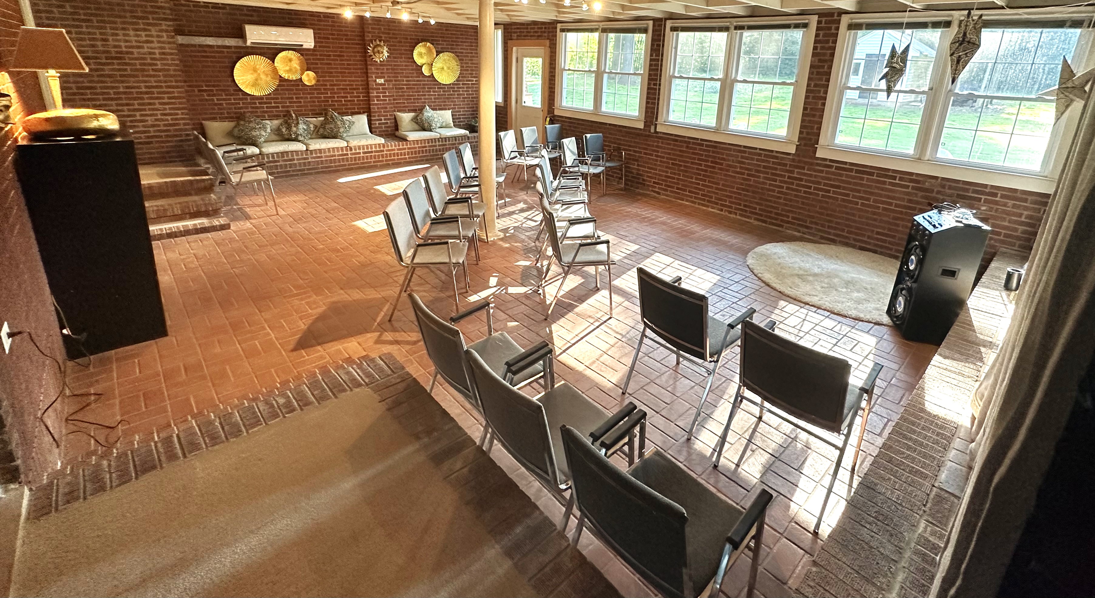 Our large group space bathed in light with windows overlooking out outdoor gardens at Creative Perspectives in Mount Holly.
